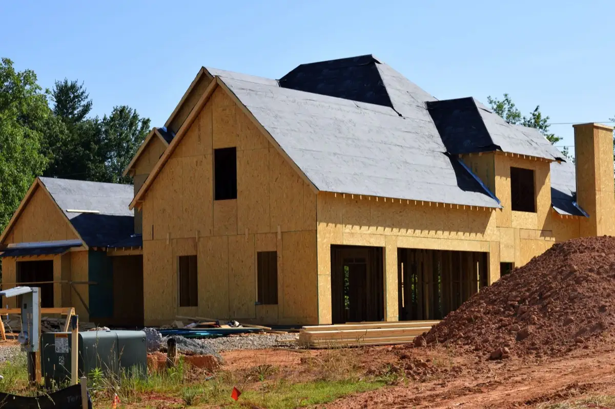 House with new roof decking and synthetic underlayment during a roof replacement in Gulfport, MS